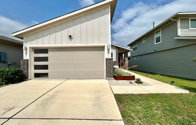 Modern and Cozy 3BR/2BA Home with Garage, Fenced Yard & Covered Deck!