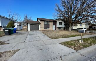 West Jordan Remodeled Four Bedroom; Garage; New Kitchen Cabinets; Fenced Yard; Central Air