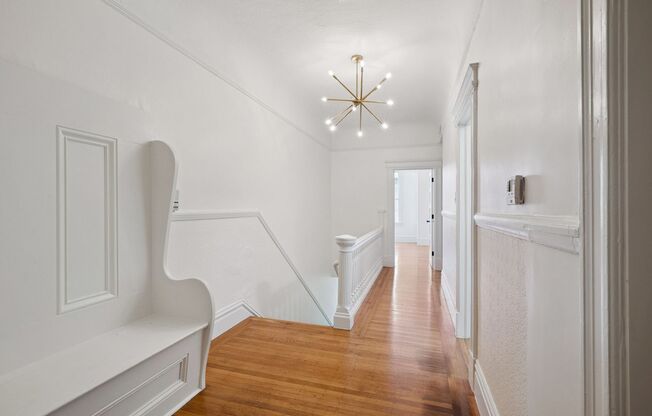 Bright pet friendly 3BR 2BTH with modern kitchen, wood flrs and laundry in unit!
