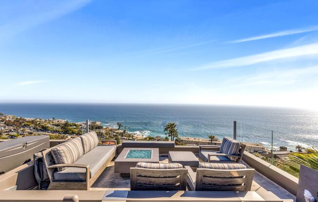 Contemporary Modern Masterpiece with Rooftop Deck and White Water Ocean Views in Laguna Beach