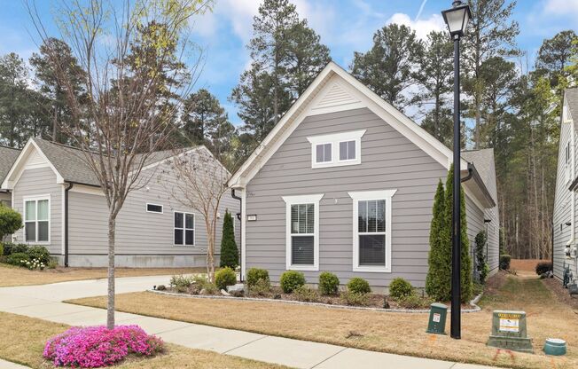 Fully Furnished Home in Del Webb - Wake Forest! Backyard is fully fenced.