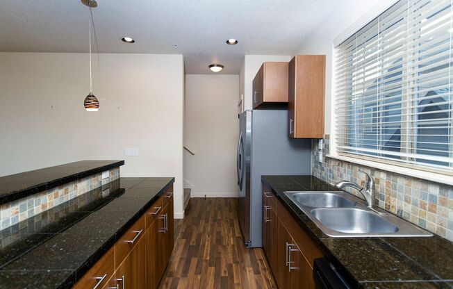 2BD 2.5BA + Office + Tri Level Townhouse w/Garage + AC + Balcony + Washer/Dryer Included
