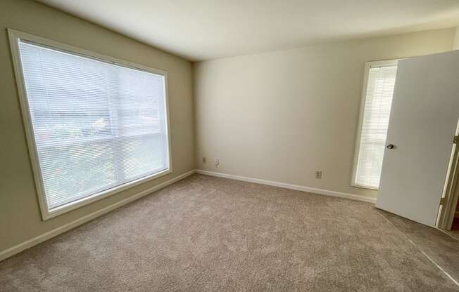 Drayton main bedroom with large windows located in Duluth, GA