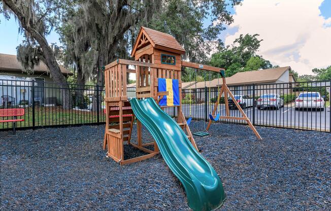 a playground in front of a house