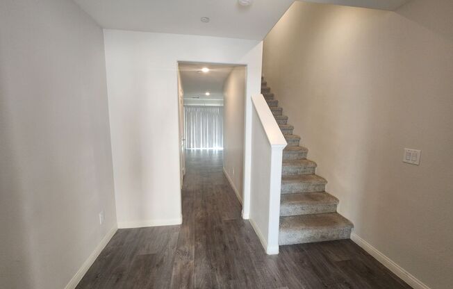 Modern three-story townhome in exclusive Panorama gated community.