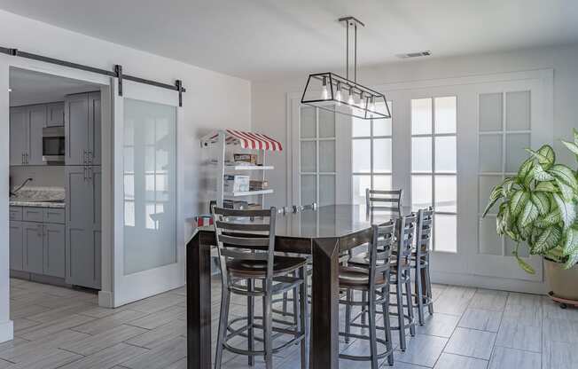 Eat-In Table With High Chairs In Clubhouse at Millcroft Apartments and Townhomes, Milford, Ohio