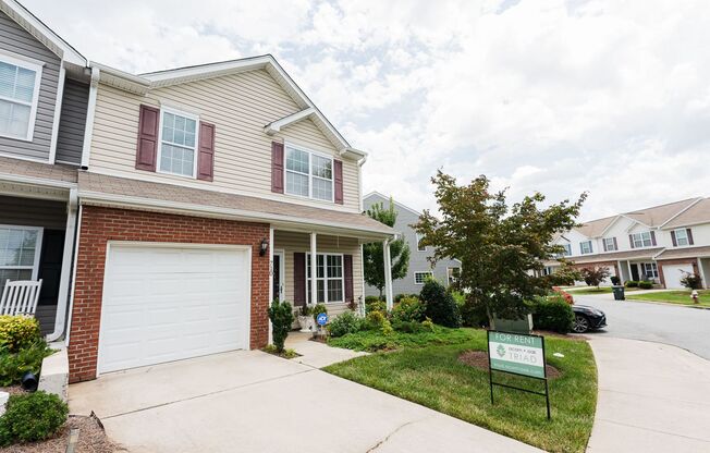 Immaculate beautiful 3-bedroom, 2.5-bath townhouse in Greensboro with 1 car garage/fenced in patio