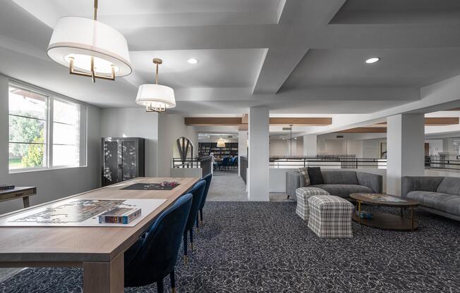 a room filled with furniture and a large window