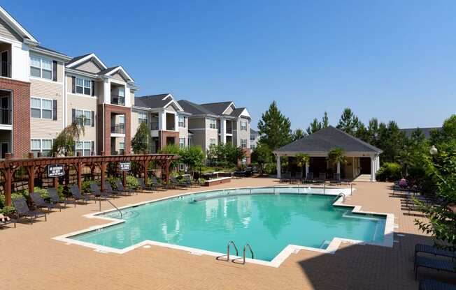 Swimming Pool With Relaxing Sundecks at Abberly Village Apartment Homes by HHHunt, West Columbia