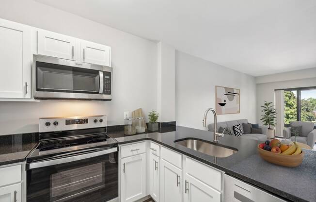 kitchen with stainless steel appliances at Residences at Manchester Place in Manchester New Hampshire