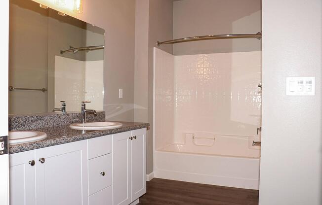 a kitchen with a sink and a refrigerator