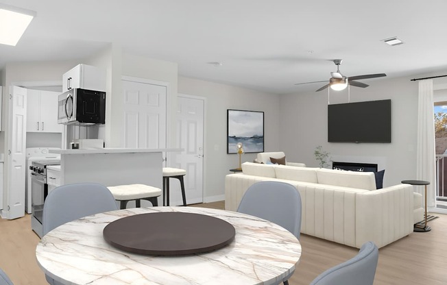 A modern living room with a kitchen area in the background.