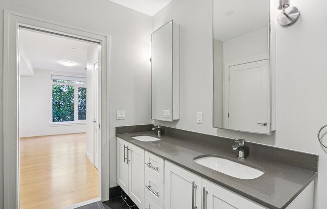 Bathroom with granite countertops at Park77 Apartments, Massachusetts