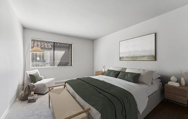 Model Bedroom with Carpet and Window View at Creek at 2645 Apartments located in Sacramento, CA.
