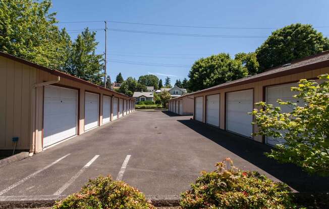 a long row of garages on the side of a building