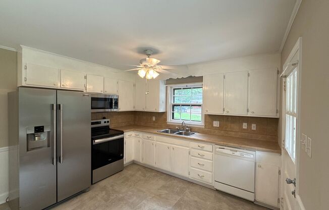 Charming Brick Ranch Home In Cambridge Park Community