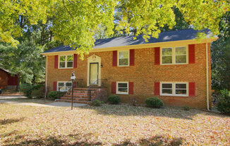 Available early JULY! Beautifully renovated 4 bedroom home with large fenced backyard in SW Durham!