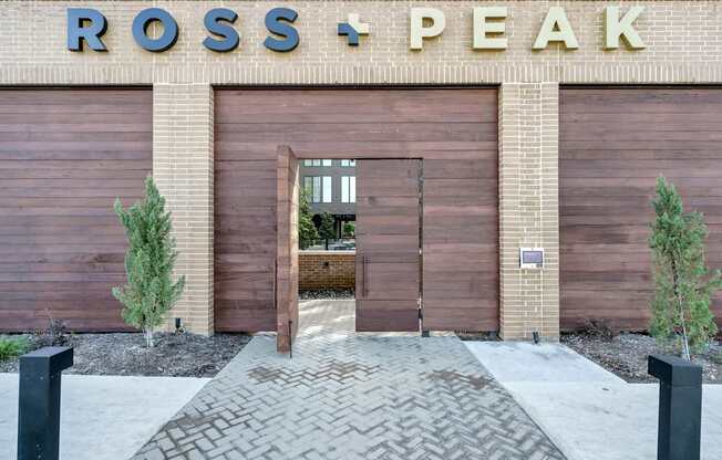 A building with a sign that says Ross + Peak.