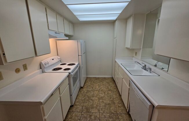 Move-In Special: 1/2 off 1st Month's Rent!!!  Freshly Painted 1-Bedroom Condo with Covered Parking