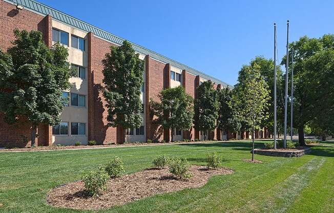 outdoor view of the property, with brown and tan bricks