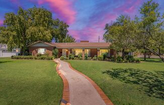 Classic Red Brick Beauty in Prestigious North Central Park