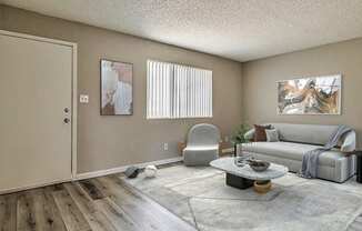 a living room with a couch chair and coffee table