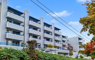 AVAILABLE OCTOBER 24th! Queen Anne Condo with Free Garage Parking, Utilities Included, and Private Balcony!