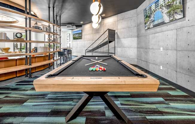 a pool table in a game room with a billiardsat The Overlook, Winter Garden