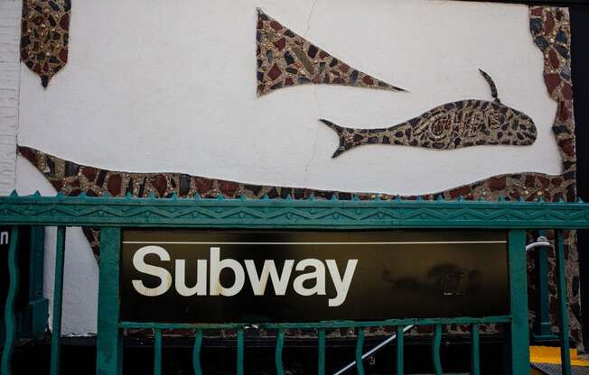 a sign for a subway store with fish on it at The Paxton, Brooklyn