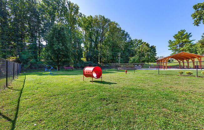 a park with a playground and a swing set at Copper and Quarry Village, Maryland, 21209