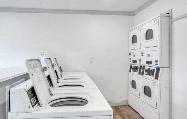 the preserve at ballantyne commons apartment laundry room with washer and dryer