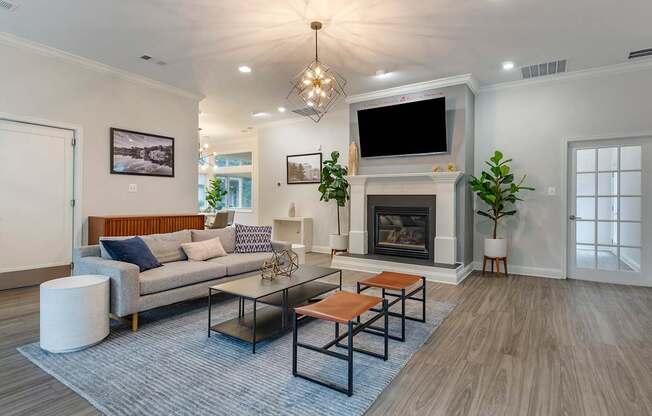 Clubhouse With Expansive Windows and fireplace at The Apartments at The Sycamores, Reston, VA, 20190