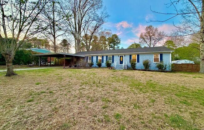Charming Ranch with Fireplace, Two Living Areas & Large Lot – Minutes to Downtown