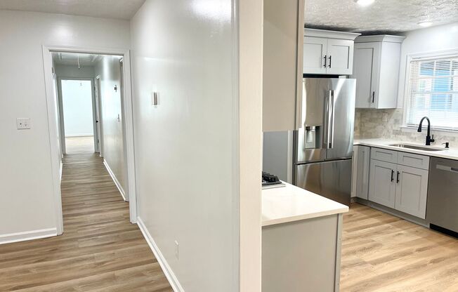 Welcome to this stunning 5-bedroom, 2-bathroom home located in the charming town of Fairburn, GA.