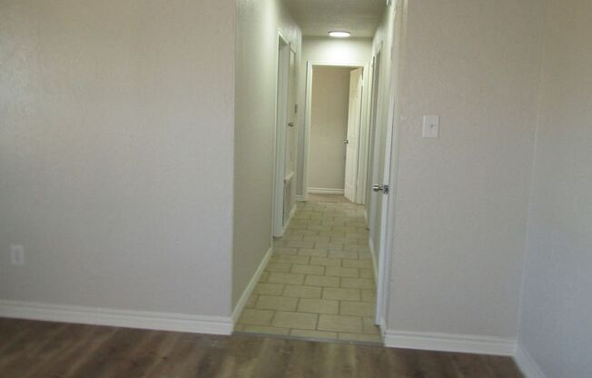 New listing-fresh paint and hard surface flooring. Housing assistance approved