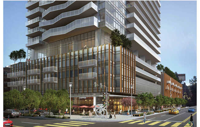 A modern building with a lot of windows and balconies.