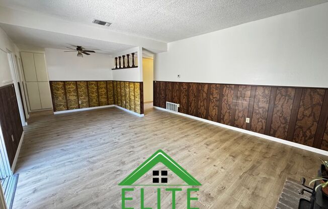 **Spacious 5-Bedroom Home with Modern Upgrades and Private Backyard Available Now**