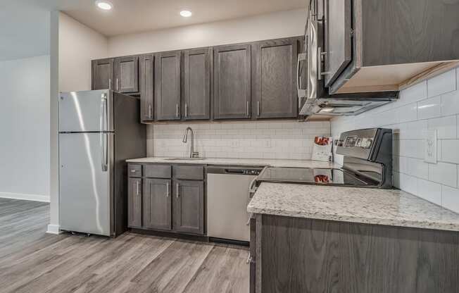 Kitchen with Granite Countertops and Stainless Steel Appliances