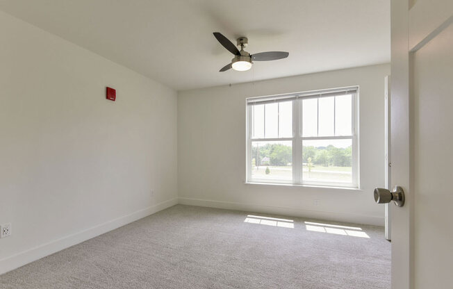 Spacious Bedroom with Large Windows at Dodson Pointe Apartment Homes, Rogers, AR, 72758
