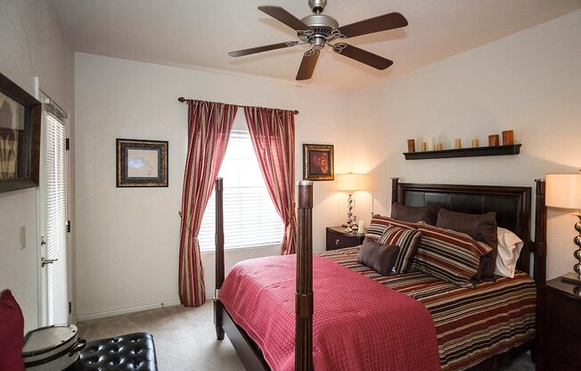 Spacious bedroom with ceiling fans