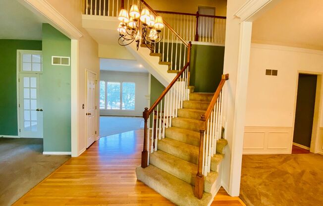 {8514}  Village of Kensington + Finished Basement + 3 Car Garage + Community Pool + Blue Valley Schools!