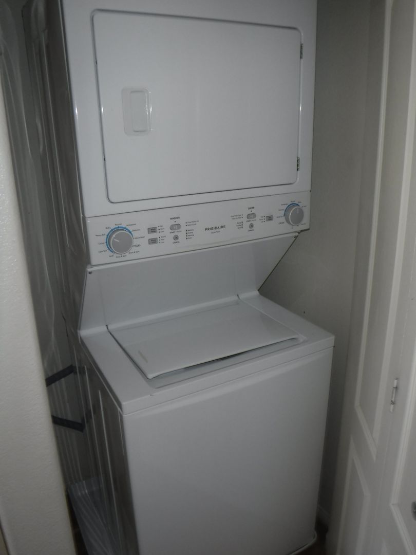 SECOND STORY CONDO IN GATED COMMUNITY WITH ACCESS TO POOL/SPA