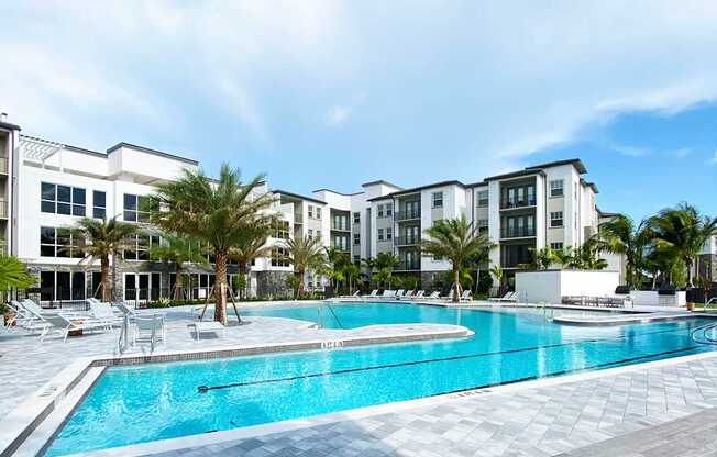 Heated saltwater pool with swim lane, cabanas, sun shelves and WiFi