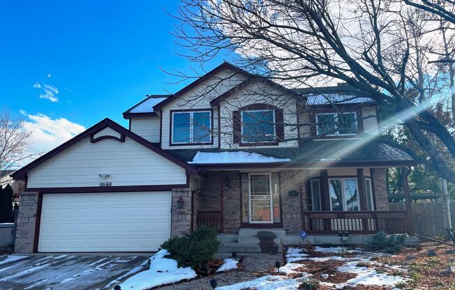 Exquisite remodeled 3BR den, 2 1/2 bath home in Countryside near Standley Lake open space.