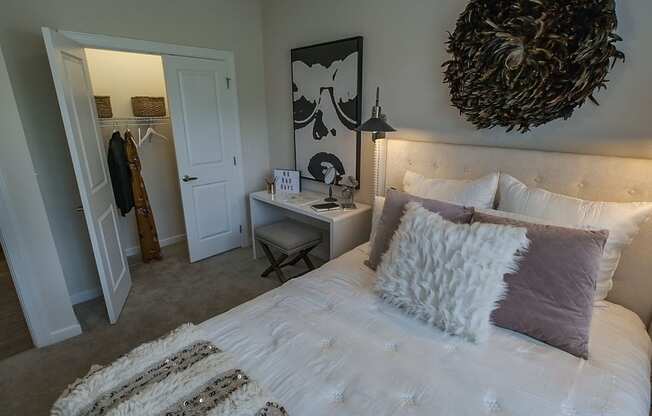 Cozy bed in bedroom at Abberly CenterPointe Apartment Homes, Midlothian, 23114