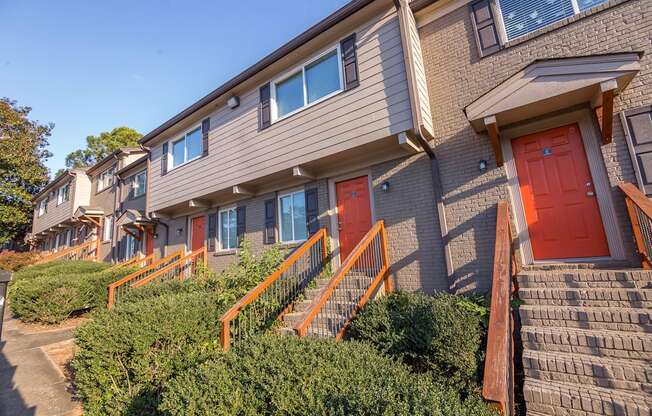 a row of houses with red doors at Broadway at East Atlanta, Atlanta, GA, 30316