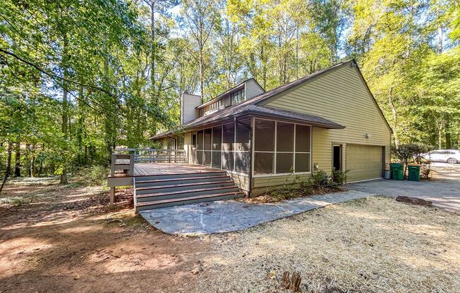 Spacious Contemporary Home in a Private Wooded Setting