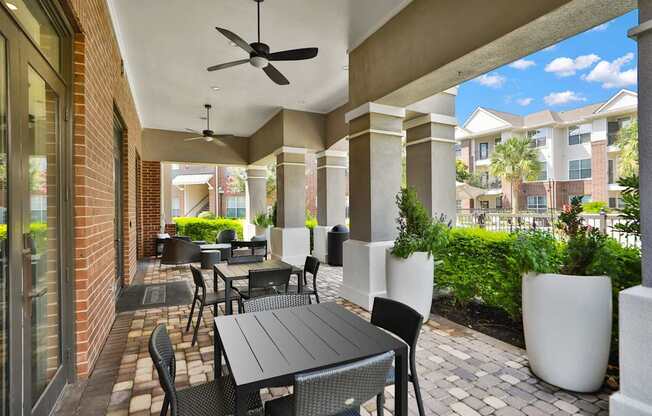 Outdoor Patio Area at Madison on the Meadow Apartments in Stafford, TX 77477