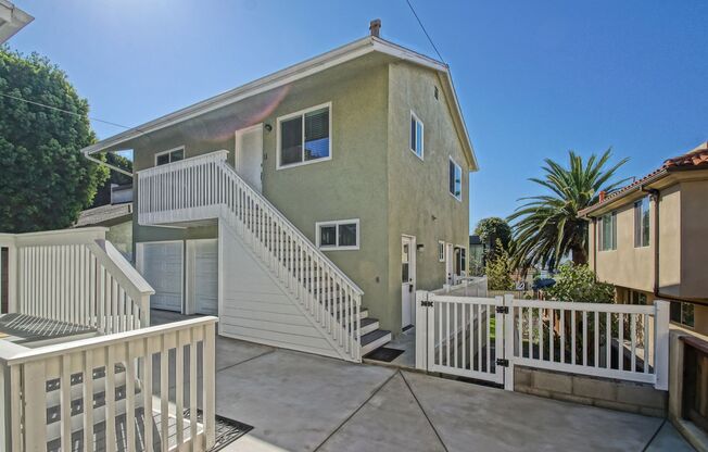 NEWLY REMODELED, SPLIT-LEVEL 3BR2BA DUPLEX W/ OCEAN VIEW, SPACIOUS YARD/PATIO & LARGE 2-CAR GARAGE ON QUIET STREET JUST BLOCKS TO SCHOOLS, PARK, SHOPPING & BEACH!