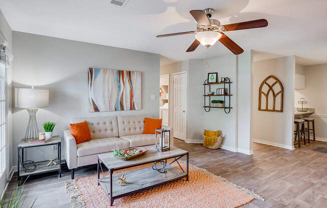 Open Concept Living with Ceiling Fan and Light